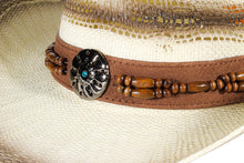 Load image into Gallery viewer, Close-up view of circular bead ornament of a beige straw cowboy hat.
